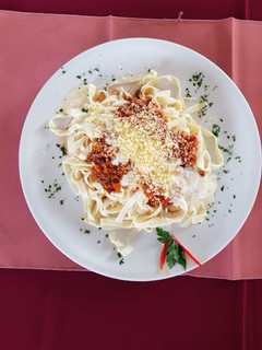 Una foto de Fideos Caseros con Salsa Roja
