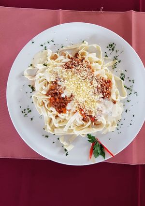 Una foto de Fideos Caseros con Salsa Roja