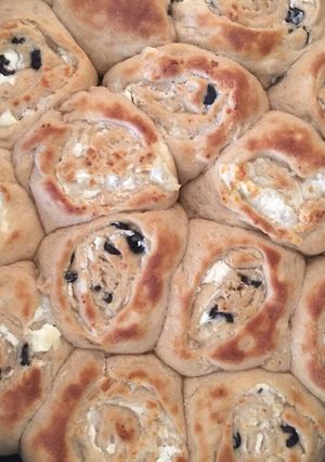 A picture of Cheese and olives pastries.