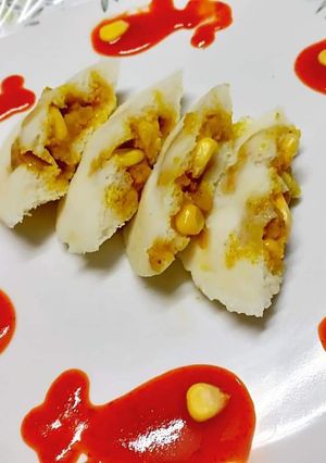 A picture of Corn potato stuffed idli /bharuva idli.