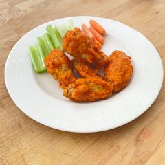 Saucy and crispy chicken wings A picture of Saucy and crispy chicken wings.