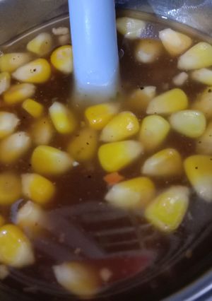 A picture of Hot and sour soup with corns.