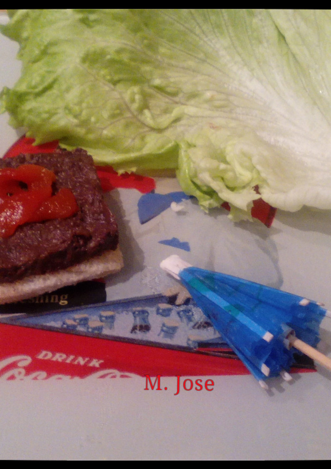 Una foto de Canapé de morcilla con pimiento