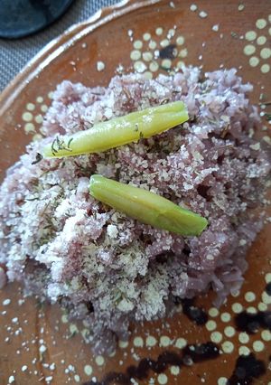 Una foto de Risotto al vino tinto 🍚🍷