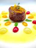 Filetto di vitello con salsa d'arancia al peperoncino e uva