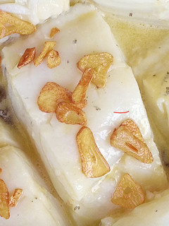 Una foto de Bacalao al pil-pil