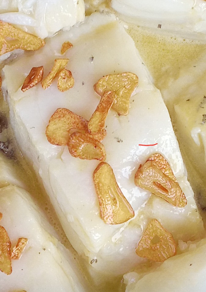 Una foto de Bacalao al pil-pil