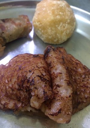 A picture of Meetha Pudla (sweet pan cake).