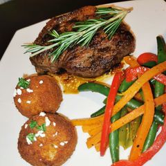 Rosemary Beef Picanah, Mash potato balls with Veggie stir fry A picture of Rosemary Beef Picanah, Mash potato balls with Veggie stir fry.