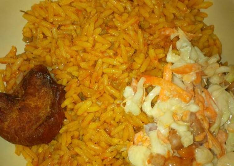 Jollof rice, coleslaw and chicken