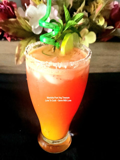 A picture of Orange Watermelon Sunrise Mocktail.