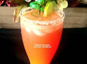 A picture of Orange Watermelon Sunrise Mocktail.