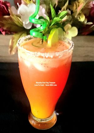 A picture of Orange Watermelon Sunrise Mocktail.