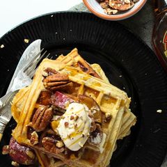 A picture of Sweet Potato and Pecan nut Waffles with Maple syrup.