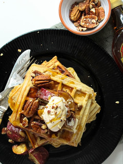 A picture of Sweet Potato and Pecan nut Waffles with Maple syrup.