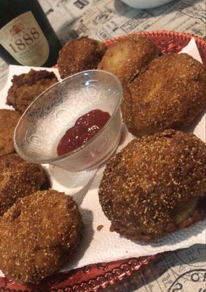 Una foto de Aros de cebolla rellenos