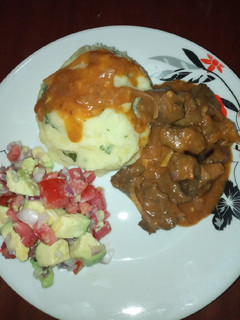 A picture of Liver with onions...and gravy.