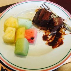 A picture of Chocolate cake with fruits.
