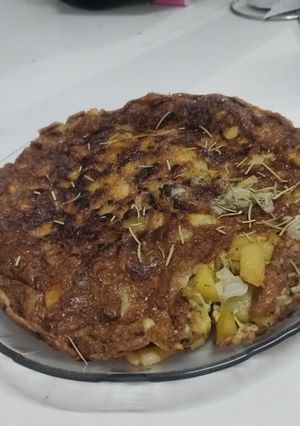 Una foto de Tortilla de Papa a las Finas Hierbas. Sin harina