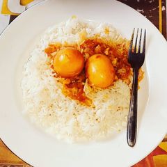 A picture of Egg curry rice.