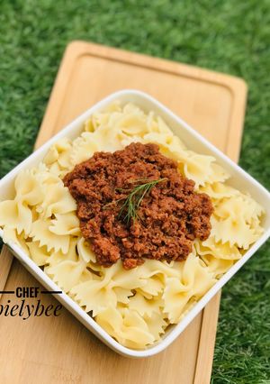 A picture of Jamaican style Corned beef x farfalle pasta.
