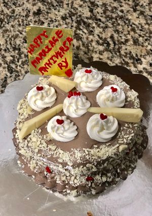 A picture of Eggless Black Forest cake 🎂.
