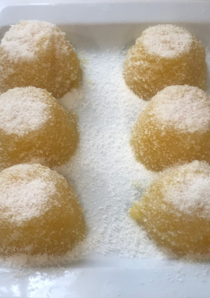 Una foto de Bocaditos de naranja con ralladura de coco