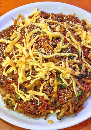 A picture of Japchae (Sweet potato starch noodles).