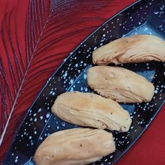 A picture of Namkeen layered mathri 🌙🌙💫💫.