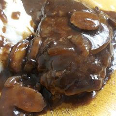 A picture of Hamburger Steaks with Mushroom-Onion Gravy.