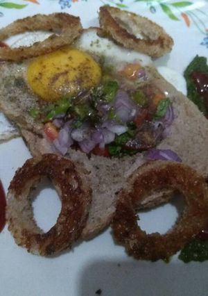 A picture of Multi grain bread with egg hole.