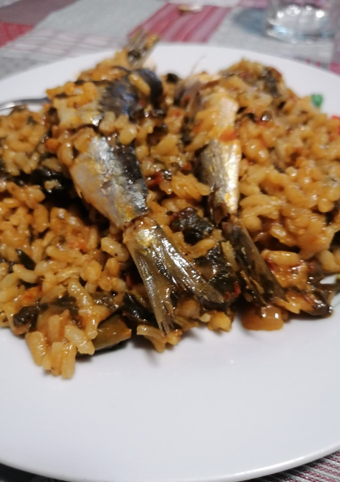 Una foto de 91. Arroz meloso con sardinas