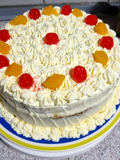 Una foto de Torta manjar durazno nuez