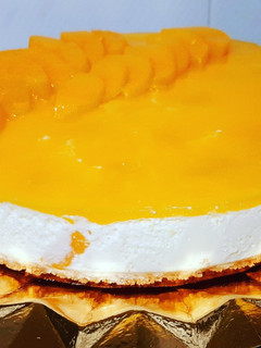 Una foto de Tarta fría de melocotón en almíbar