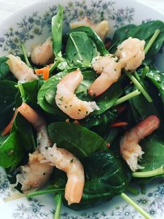 A picture of Shrimp spinach salad.