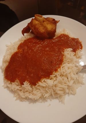A picture of Nigerian Rice and Chicken Stew.