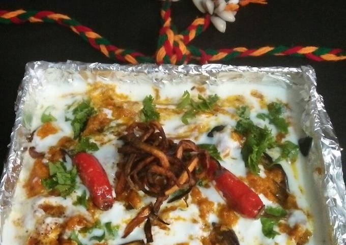 Steps to Make Speedy Sliced brinjal in curd