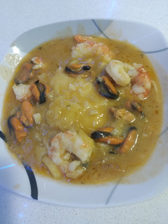 Una foto de Merluza con salsa de fumé gambón y mejillones