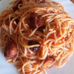 A picture of Spaghetti with minibites.