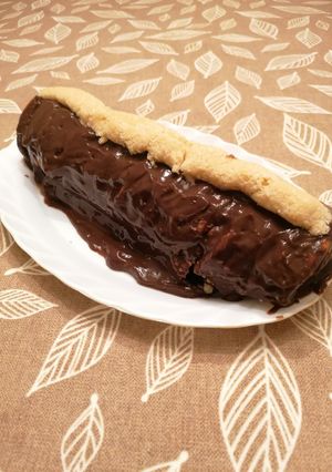 Una foto de 219. Brazo de gitano de coco y chocolate