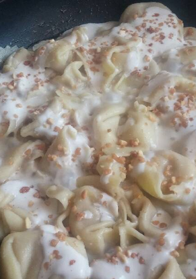 Una foto de 901. Tortellinis con salsa afro