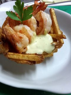 Una foto de Langostinos con Alioli de Pimientos de Padrón