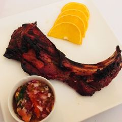 A picture of Orange and honey BBQ ribs.