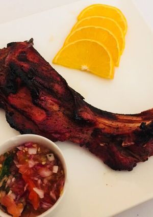 A picture of Orange and honey BBQ ribs.