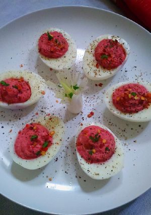 A picture of Deviled Eggs with Beetroot Hummus.
