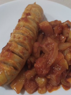 Una foto de Currywurst exprés