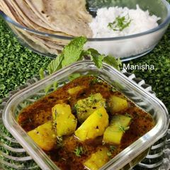 Hot & Sour Lauki Aloo Curry(Bottle Gourd-Potato) A picture of Hot & Sour Lauki Aloo Curry(Bottle Gourd-Potato).