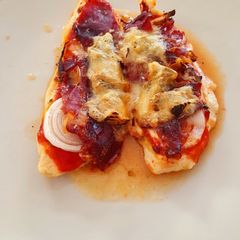 A picture of 10-minute chicken "pizza" with jamón ibérico and gorgonzola.