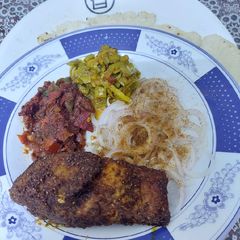 Lunch platter Fried fish Tomato chutney A picture of Lunch platter Fried fish Tomato chutney.
