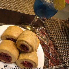 A picture of Beef sausage roll and electric lemonde.